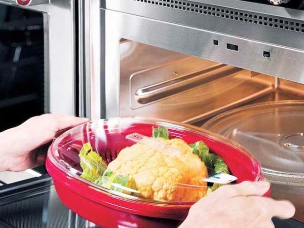 Safety precautions to boil water in microwave