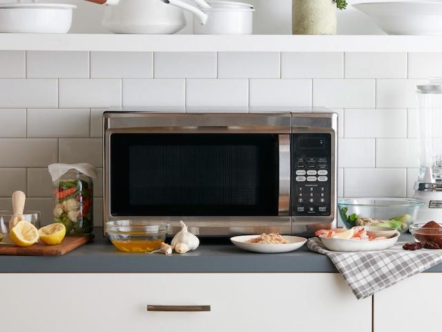 Countertop microwave oven used to heat food and cook food